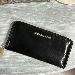 Michael Kors shiny black gold zipper full sized wallet like new condition!